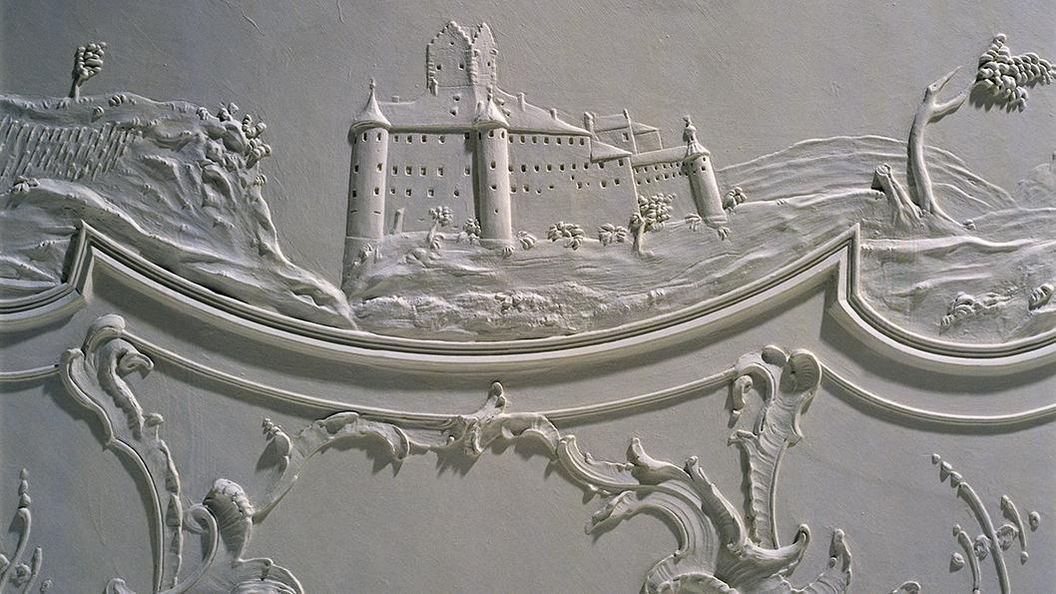 Detail of stucco by Joseph Anton Pozzi, Meersburg castle with vineyards and lake