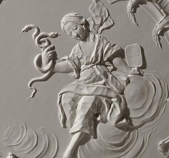 “Sapientia” with snake and mirror, late Rococo stucco in the Chapel Room at Meersburg New Palace, by Carlo Pozzi, 1760/62